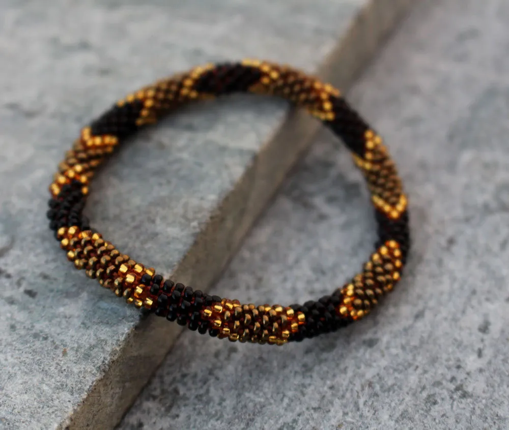 Golden Black Beads Roll Bracelet