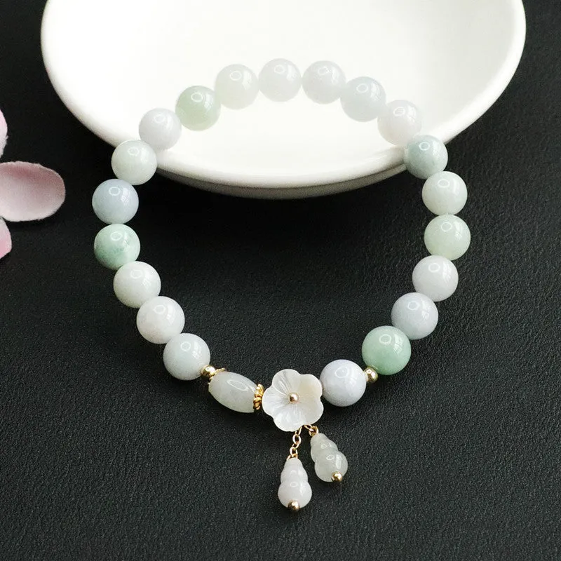 Jade Tassel Bracelet with Sterling Silver Flower Detail